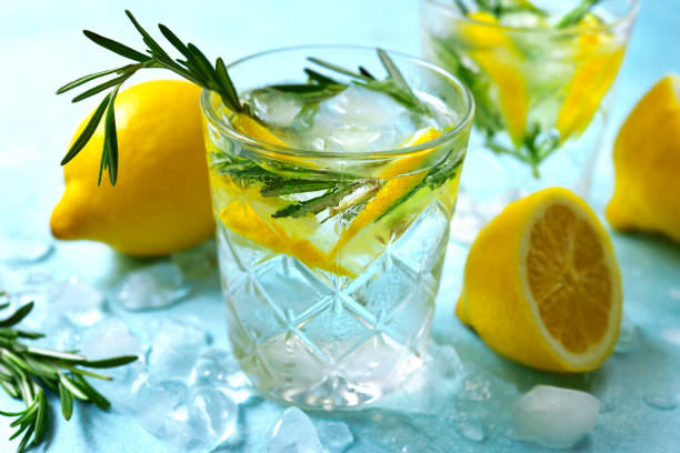 istock Summer citrus cocktail or lemonade with rosemary 1148838992