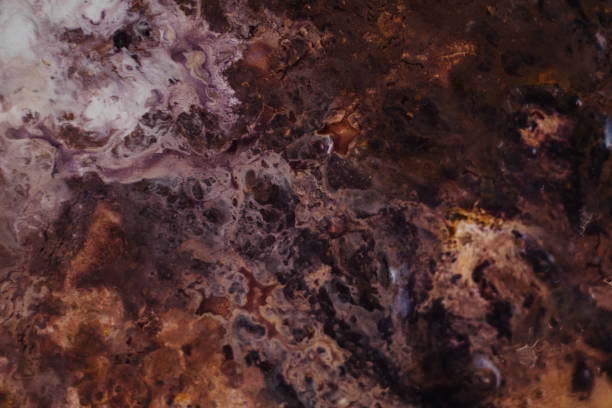 istock abstract purple brown paint background macro art 1148839012