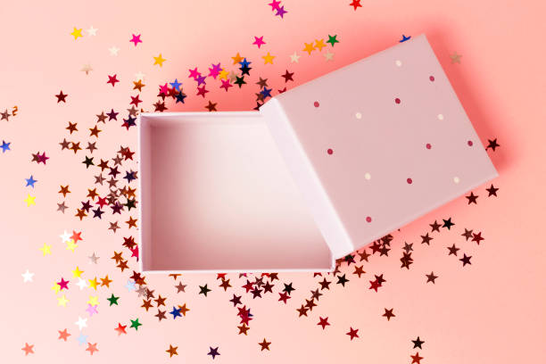 istock Open Gift box on a pink background close-up, top view 1148840587