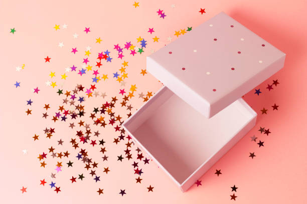 istock Open Gift box on a pink background close-up, top view 1148840612