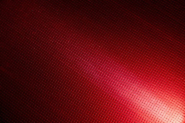 istock On a red background diagonal bright beam of light 1148840722