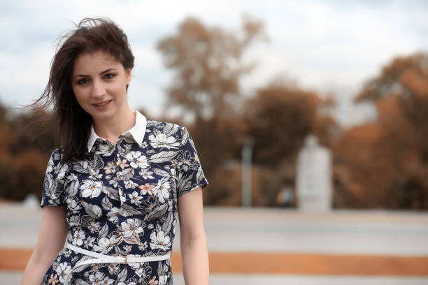 istock Beautiful girl for a walk in autumn 1148842238