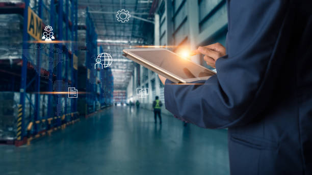 istock Business Logistics concept, Businessman manager using tablet check and control for workers with Modern Trade warehouse logistics. Industry 4.0 concept 1148850804
