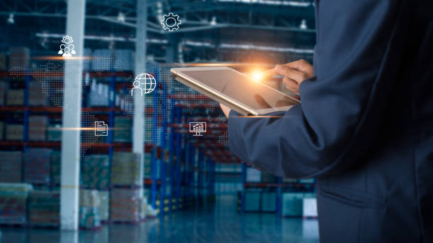istock Businessman manager using tablet check and control for workers with Modern Trade warehouse logistics. Industry 4.0 concept 1148850814