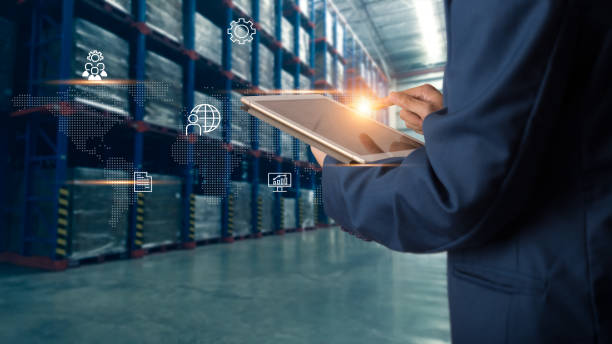 istock Business Logistics concept, Businessman manager using tablet check and control for workers with Modern Trade warehouse logistics. Industry 4.0 concept 1148850821