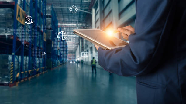 istock Businessman manager using tablet check and control for workers with Modern Trade warehouse logistics. Industry 4.0 concept 1148850823