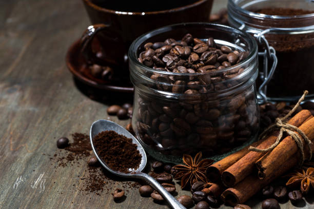 istock roasted coffee beans and spices on wooden background 1148852840