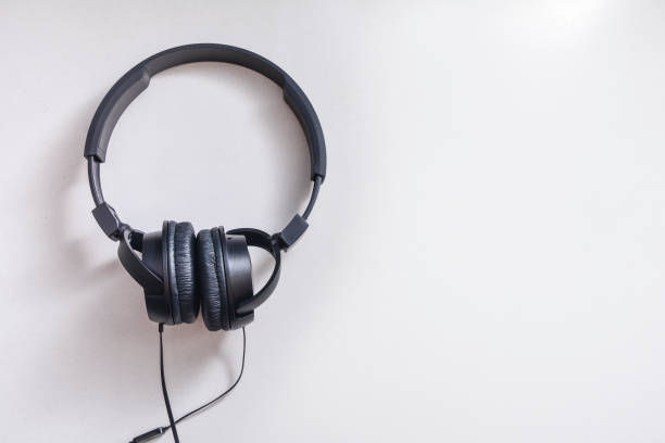 istock Black headphones on white background 1148852901