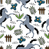 istock Horse hand drawn and floral drawing seamless pattern childish style for kids and baby fashion textile print. 1148852911
