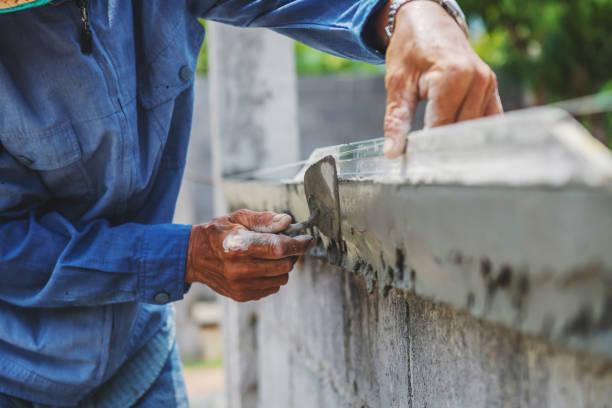 istock closeup hand of worker are plastering 1148853335