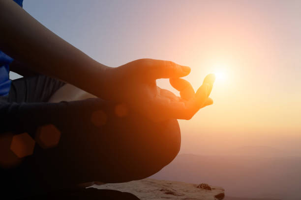 istock Young women meditate while doing yoga meditation. 1148853471