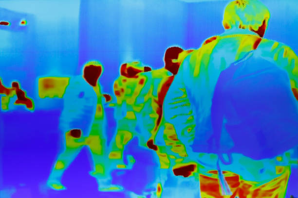 infrared thermal image of a group of passengers Infrared thermal image of a group of passengers at security control. monitoring equipment photos stock pictures, royalty-free photos & images