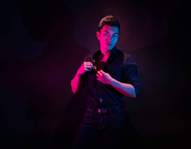 istock Handsome Asian man with black background 1148859385