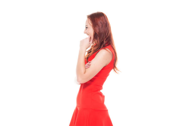 istock Beautiful female in red dress 1148859512