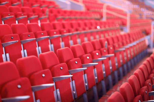 istock Rows of red numbered seats 1148859735