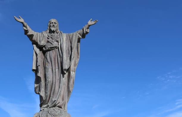 istock Concrete image of Christ arms upraised in blessing 1148861040