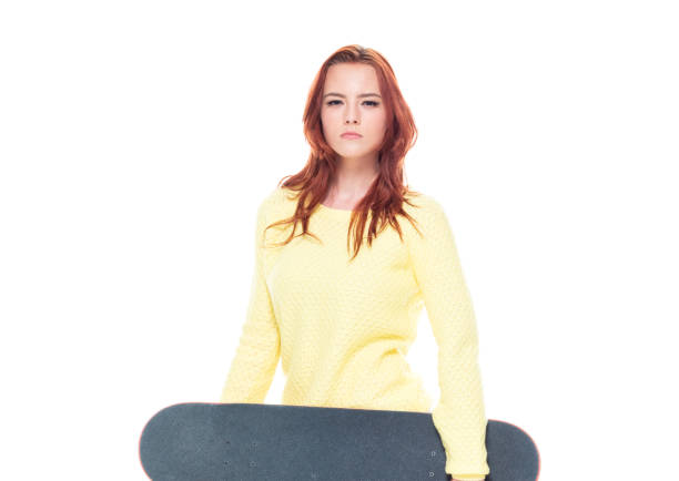istock Cute female holding a skateboard 1148861785