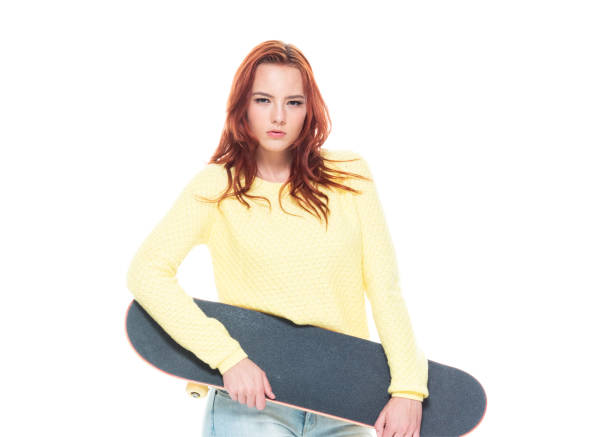 istock Cute female holding a skateboard 1148862564