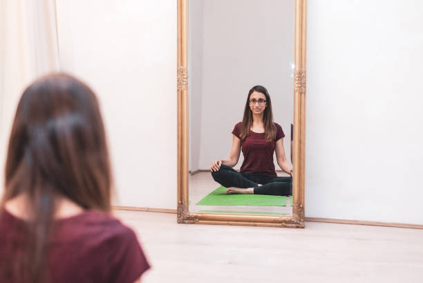 istock Woman practices concentration and meditation 1148864124