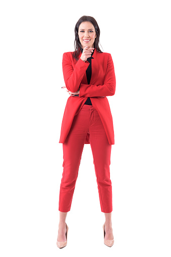 Smiling friendly business woman from human resources pointing finger showing you to join team.  Full body isolated on white background.