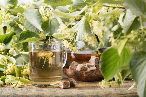 istock Glass of linden tea with brown sugar . 1148871573