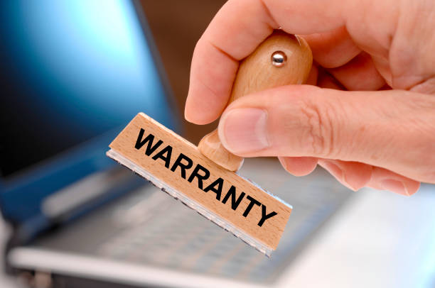istock Warranty printed on rubber stamp 1148873927