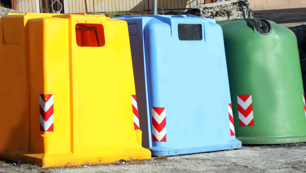 istock three colored dumpster to collect glass used paper and plastic 1148874068