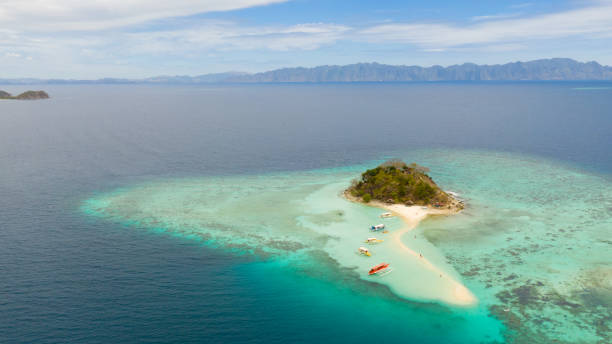 istock A small island with a sand bar in the sea, view from above 1148874404