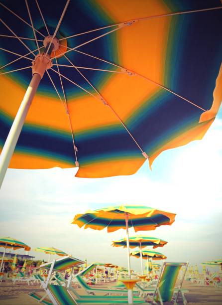 istock parasol on the beach in summer without people with toned old eff 1148874498