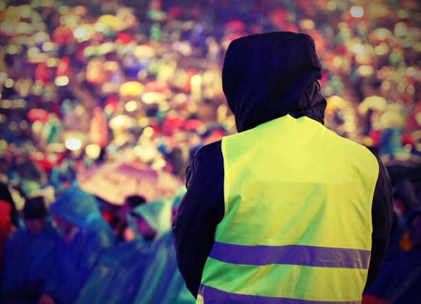 istock guy with yellow jacket works during live concert 1148874904