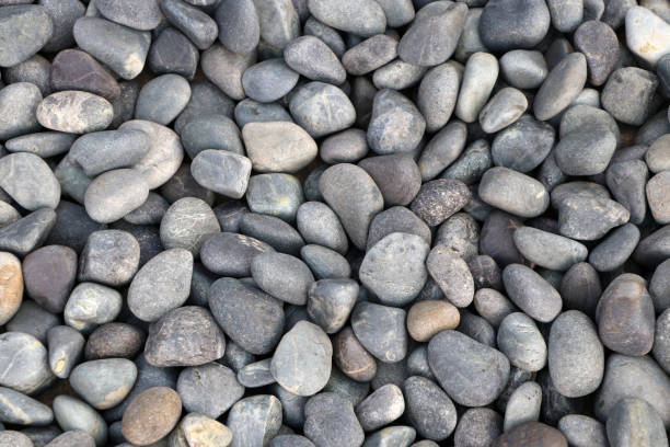 Background pattern of round pebble stone. stock photo