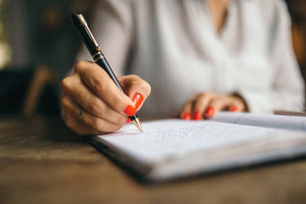 istock Woman taking minutes 1148875638