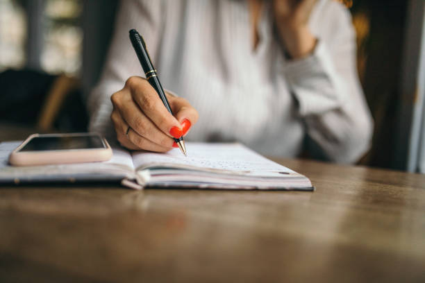 istock Woman taking minutes 1148875766