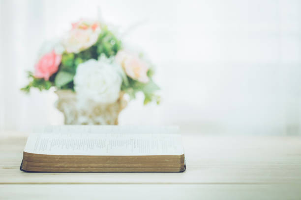 holy bible on table stock photo