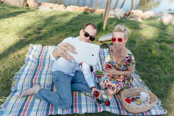 istock Young couple enjoying on picnic 1148882538