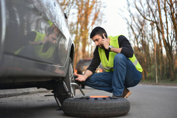 istock A broken tire on the car 1148882888