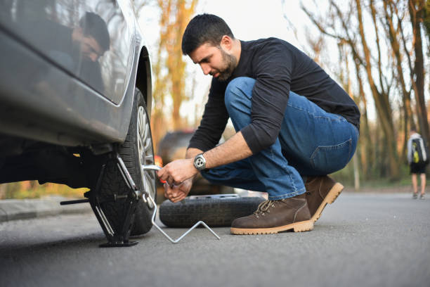 istock A broken tire on the car 1148883827