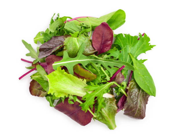 istock Mix of different salads isolated on white background. Top view. Flat lay 1148886487