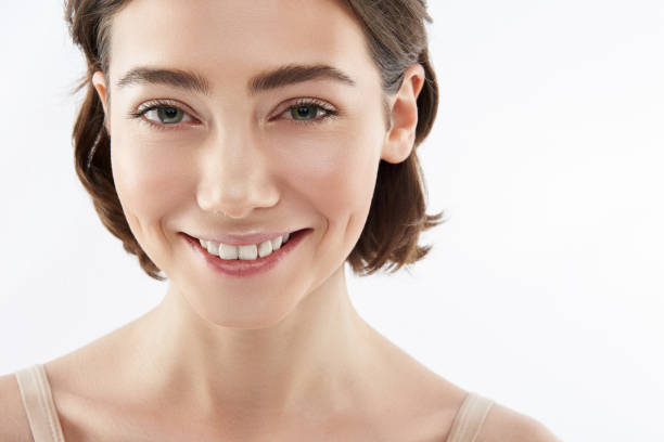 istock Front view of happy brunette female on white 1148893812