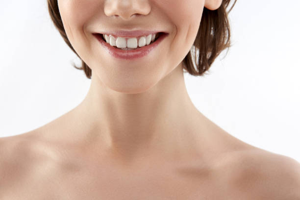 istock Low face of happy smiling brunette female 1148893911