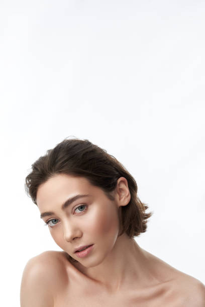 istock Young sensual pretty brunette female on white 1148893960