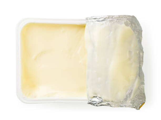 istock Processed cheese in a pack on a white. The form of the top. 1148895342