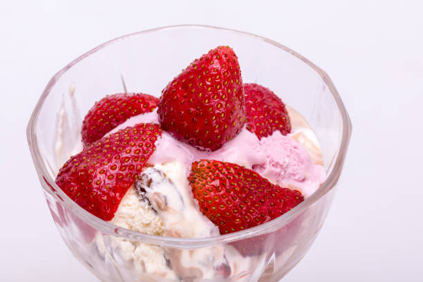istock ice cream and fresh ripe strawberries  isolated on white background 1148897757