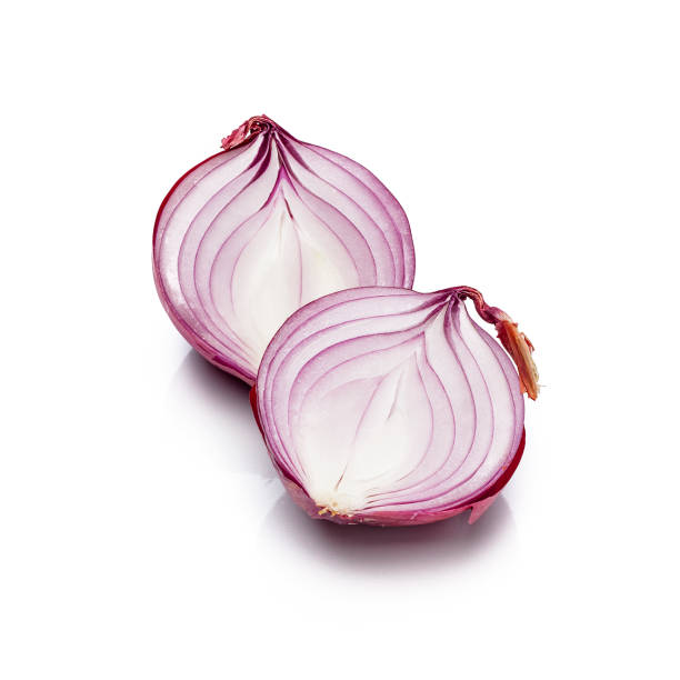 Red onion halves isolated on white background Fresh organic red onion (Also called Spanish Onion) cut in halves isolated on white background. Predominant colors are purple and white. High key DSRL studio photo taken with Canon EOS 5D Mk II and Canon EF 100mm f/2.8L Macro IS USM. spanish onion stock pictures, royalty-free photos & images