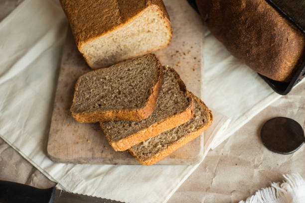 istock fresh homemade sourdough wheat form bread  served on the rustic background 1148899359