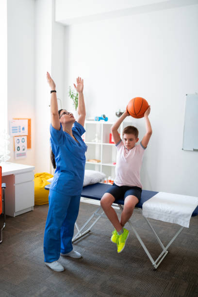 istock Active professional nurse being involved in treating session 1148899926