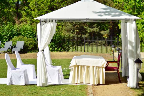 istock Wedding ceremony in a beautiful garden 1148905675