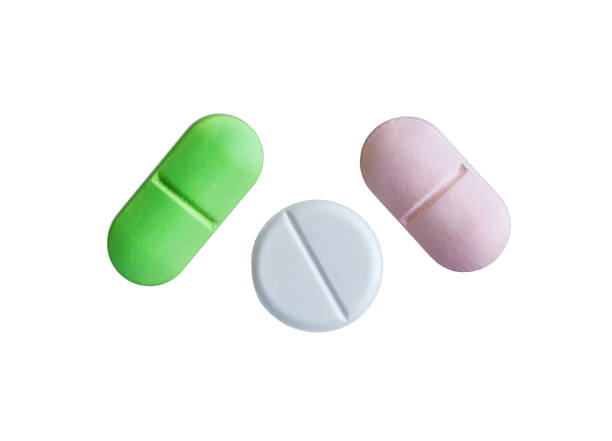 Seamless repetitive Capsule pills on blue background