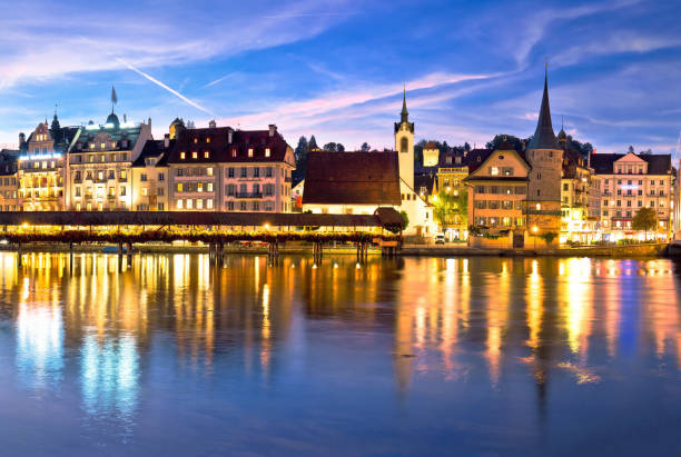 istock Luzern Kapelbrucke and riverfront architecture famous Swiss landmarks evening view 1148911673