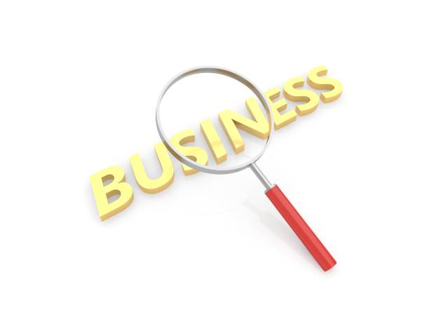 istock Inscription Business and magnifying glass . 1148913190